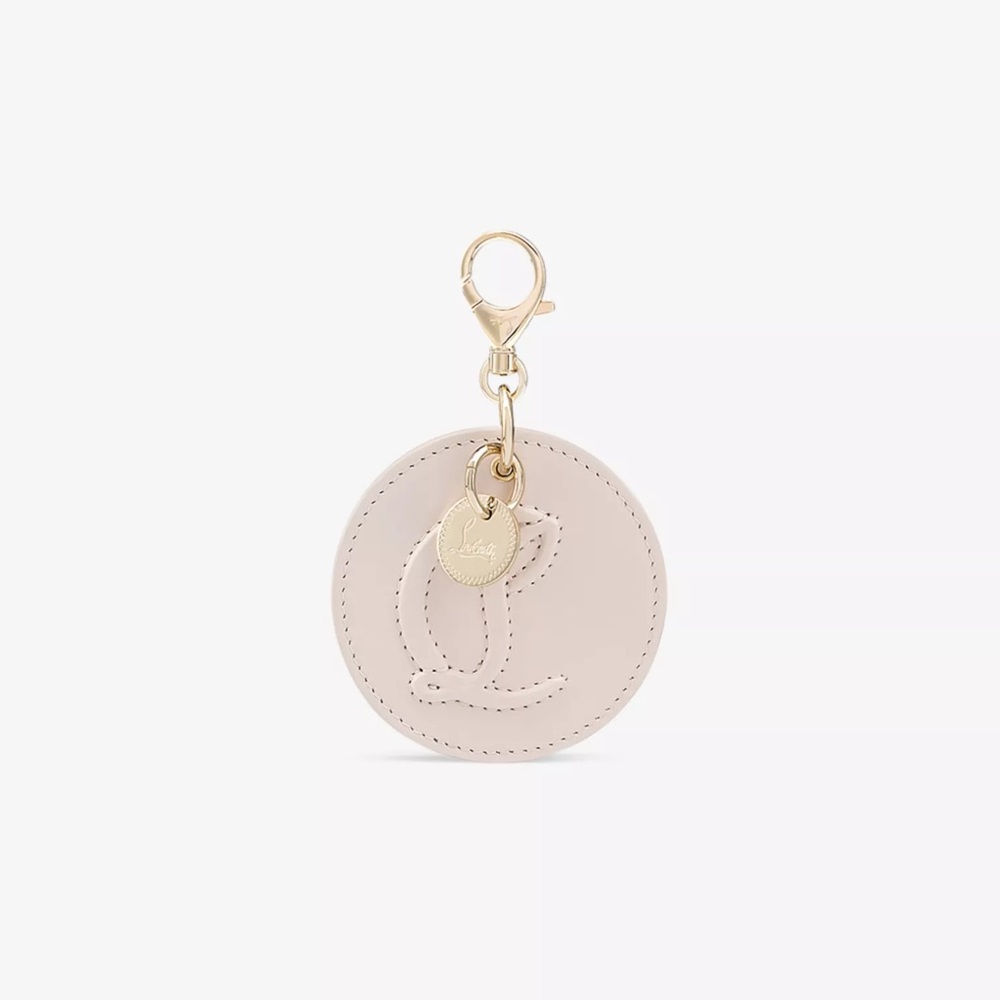 CHRISTIAN LOUBOUTIN Logo-embossed leather and brass bag charm